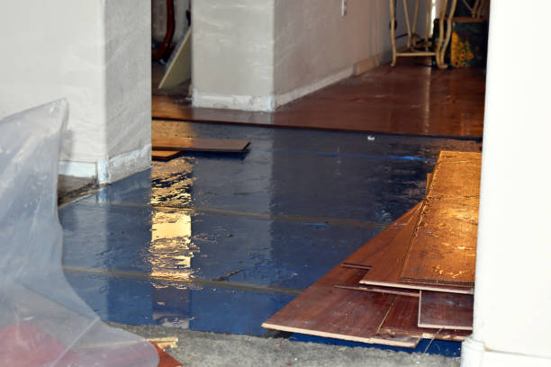 Professional Flood Damage Restoration technician working in Mitchell, IN